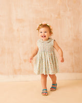 baby in hand-smocked floral summer dress
