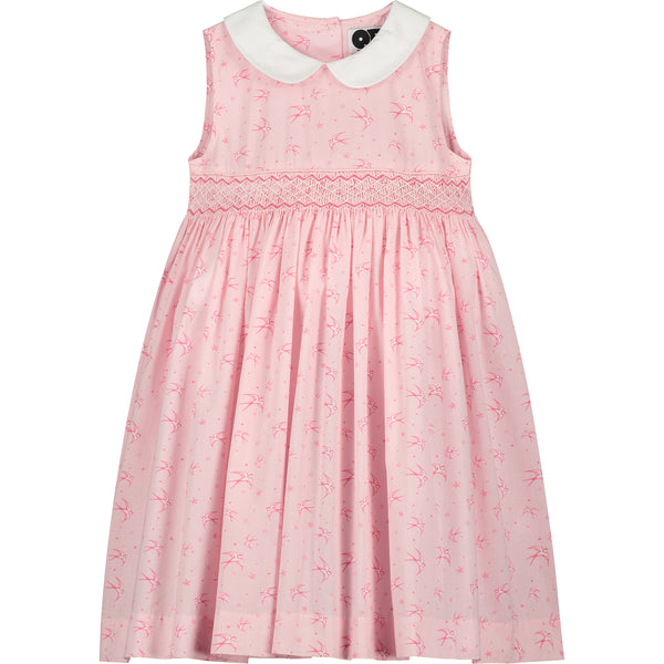 pink smocked summer dress for girls with swallow print, front  